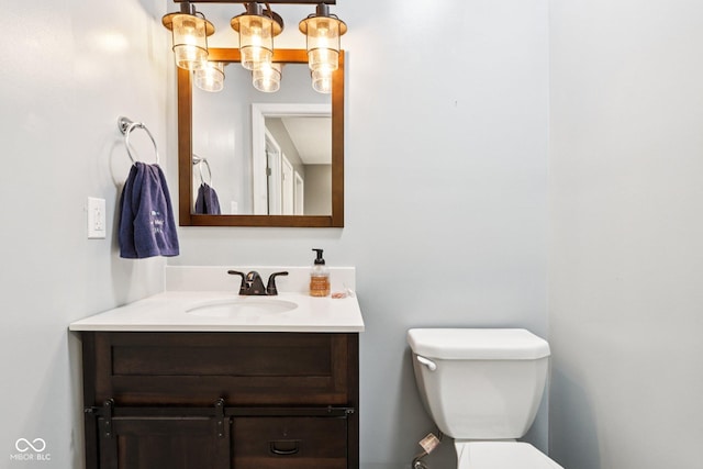 2928 Mounds Rd, Anderson, IN 46016 - bathroom featuring vanity and a chandelier
