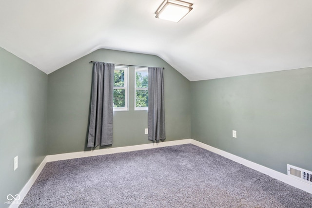 2928 Mounds Rd, Anderson, IN 46016 - additional living space with lofted ceiling and carpet flooring
