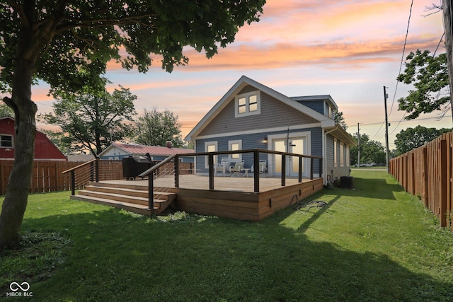 2928 Mounds Rd, Anderson, IN 46016 - rear view of house featuring a fenced backyard and a wooden deck