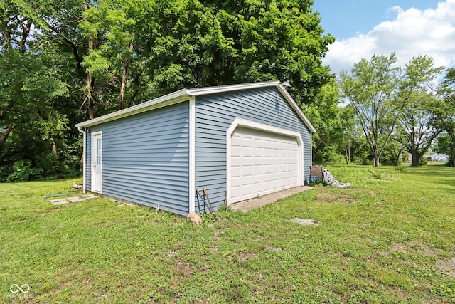2928 Mounds Rd, Anderson, IN 46016 - detached garage featuring view of scattered trees