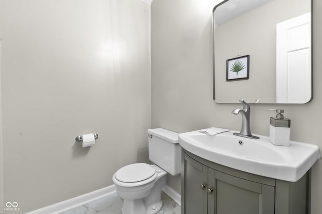 8310 Fall Creek Rd, Indianapolis, IN 46256 - half bathroom featuring marble finish floors and vanity