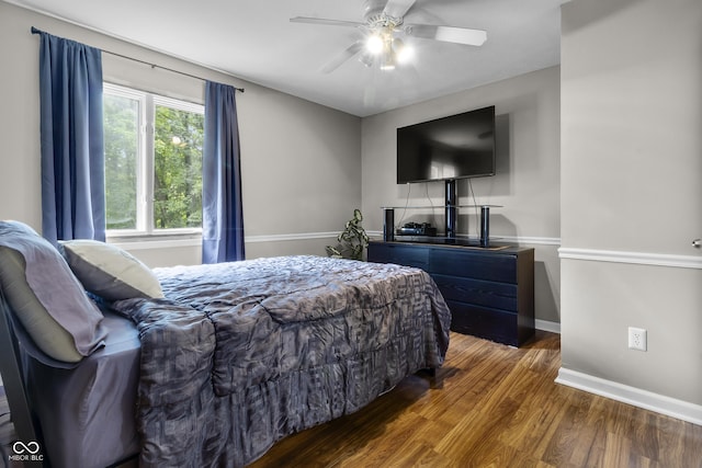 8310 Fall Creek Rd, Indianapolis, IN 46256 - bedroom with wood finished floors and a ceiling fan