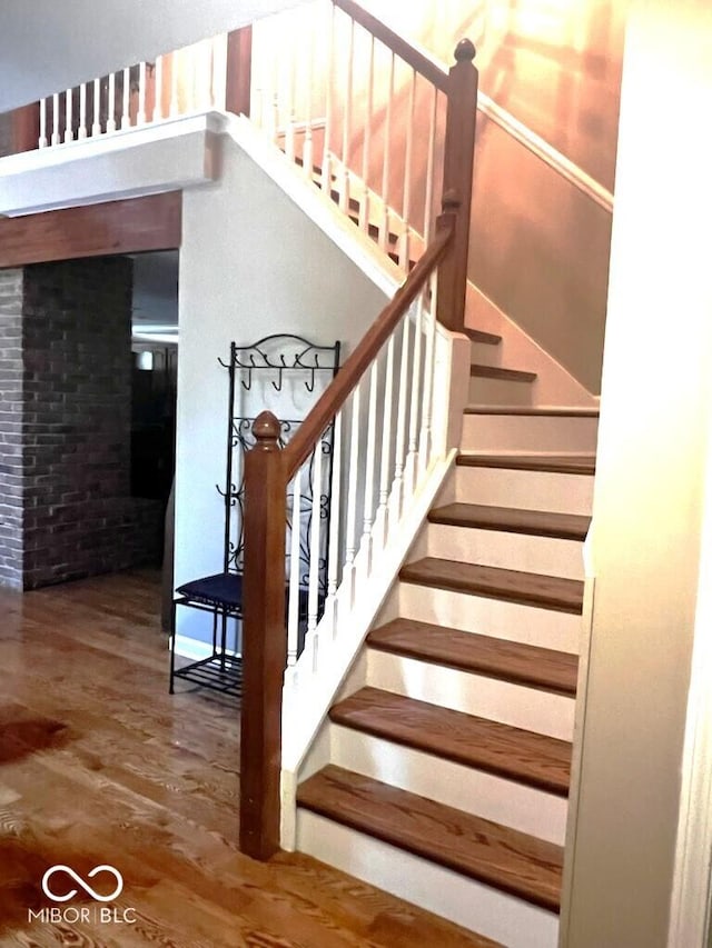 8310 Fall Creek Rd, Indianapolis, IN 46256 - stairway featuring wood finished floors