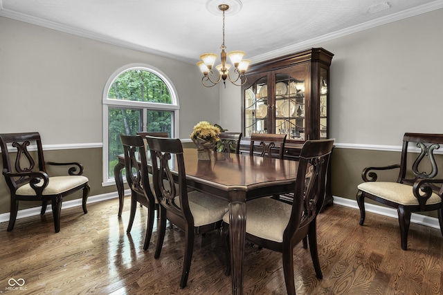 8310 Fall Creek Rd, Indianapolis, IN 46256 - dining area featuring a chandelier, crown molding, and wood finished floors