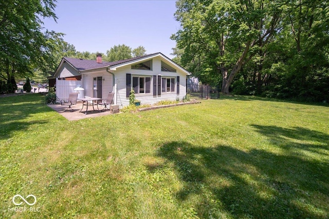 640 Shady Creek Ct, Greenwood, IN 46142 - rear view of property with a chimney and a patio area