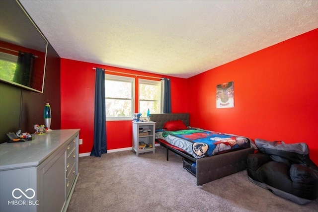 640 Shady Creek Ct, Greenwood, IN 46142 - bedroom with a textured ceiling, carpet floors, and baseboards