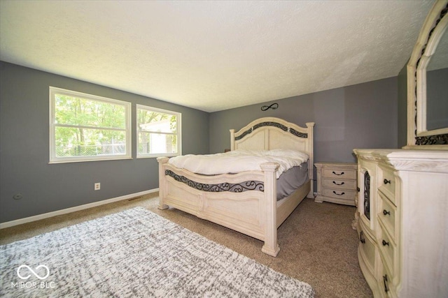 640 Shady Creek Ct, Greenwood, IN 46142 - bedroom with carpet flooring, a textured ceiling, and baseboards