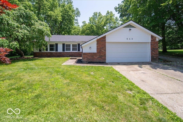 640 Shady Creek Ct, Greenwood, IN 46142 - single story home with brick siding, driveway, a front yard, and a garage