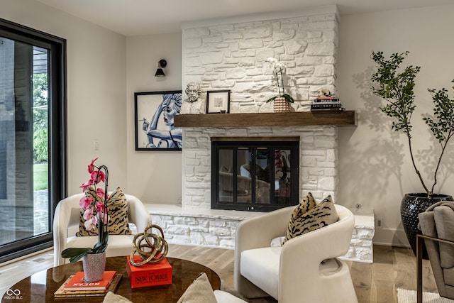 3549 W 131st St, Carmel, IN 46032 - living room featuring a fireplace and wood finished floors