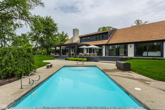 3549 W 131st St, Carmel, IN 46032 - outdoor pool with a pergola, a patio, and a lawn