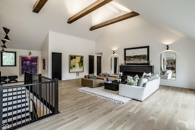 3549 W 131st St, Carmel, IN 46032 - living room with beam ceiling, light wood-style flooring, and high vaulted ceiling