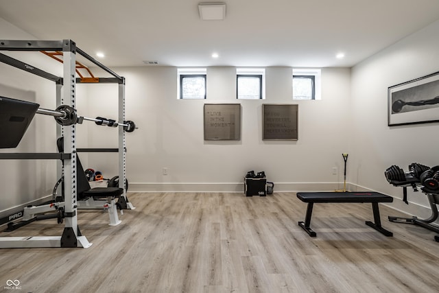 3549 W 131st St, Carmel, IN 46032 - workout room featuring wood finished floors and recessed lighting