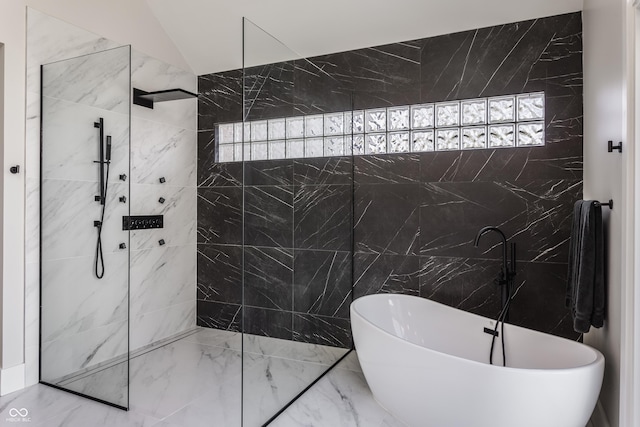 3549 W 131st St, Carmel, IN 46032 - full bath featuring marble tiled floors, a soaking tub, a marble finish shower, and tile walls