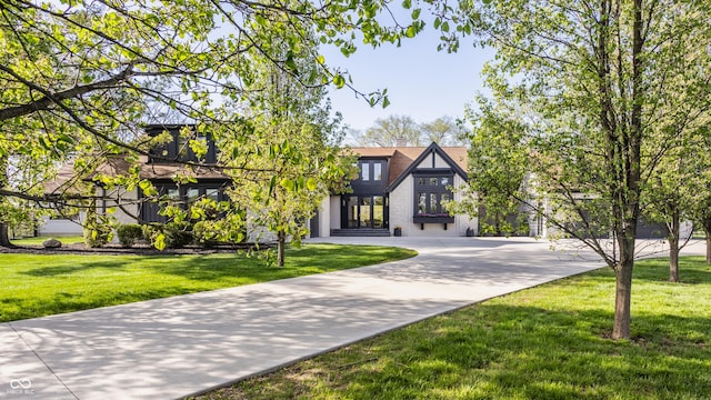 3549 W 131st St, Carmel, IN 46032 - tudor home with a front lawn