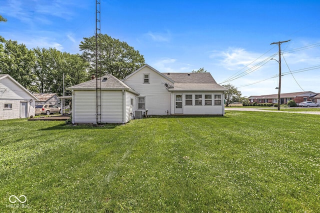 9290 Vine St, Manilla, IN 46150 - rear view of house with a yard and cooling unit