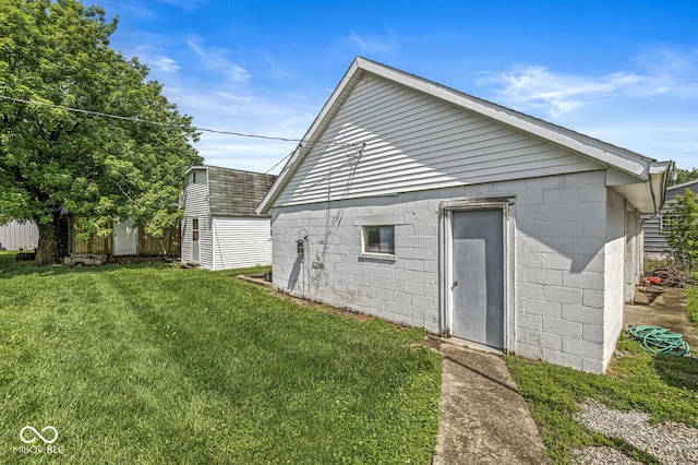 9290 Vine St, Manilla, IN 46150 - back of property with a yard and an outdoor structure