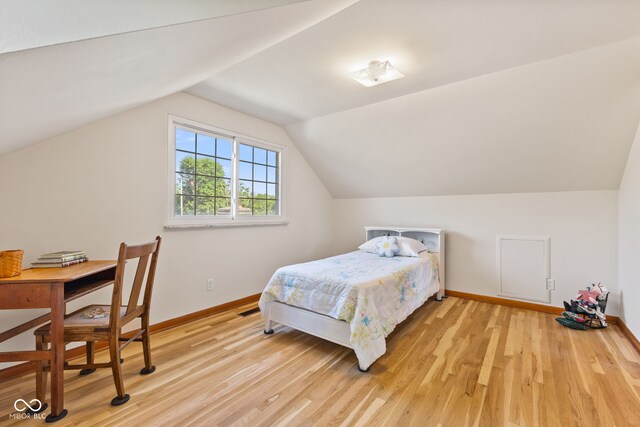 1010 Maple St, Greenwood, IN 46142 - bedroom featuring light wood-style floors and lofted ceiling