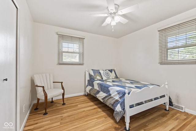 1010 Maple St, Greenwood, IN 46142 - bedroom featuring light wood-style flooring and a ceiling fan