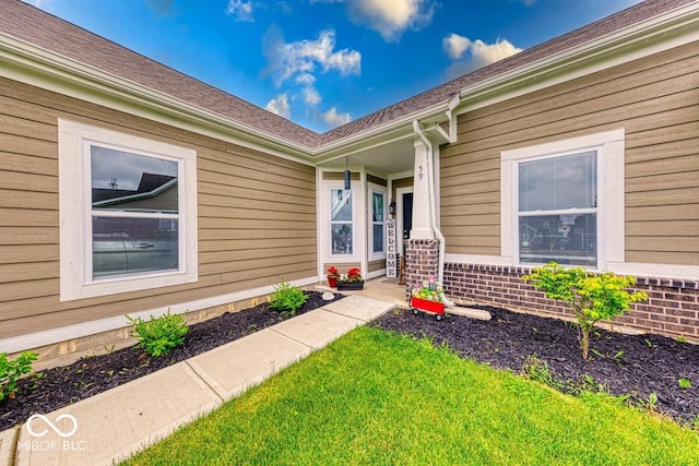 59 Manchester Dr, Trafalgar, IN 46181 - view of exterior entry with brick siding