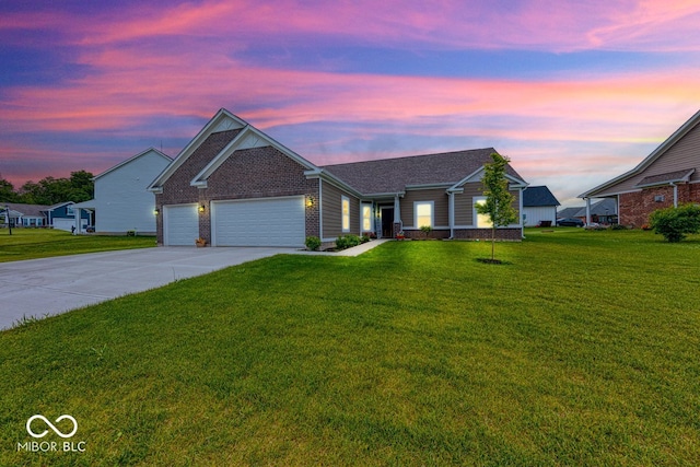 59 Manchester Dr, Trafalgar, IN 46181 - ranch-style house with driveway, a front yard, and a garage