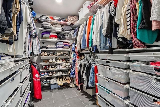 1345 Lewiston Dr, Westfield, IN 46074 - walk in closet featuring tile patterned flooring