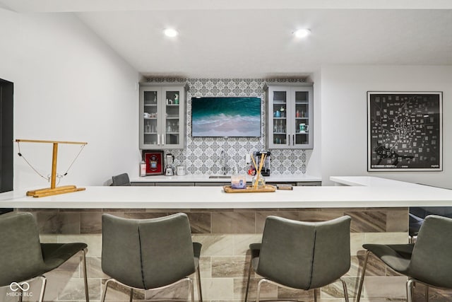 1345 Lewiston Dr, Westfield, IN 46074 - bar area with decorative backsplash and recessed lighting