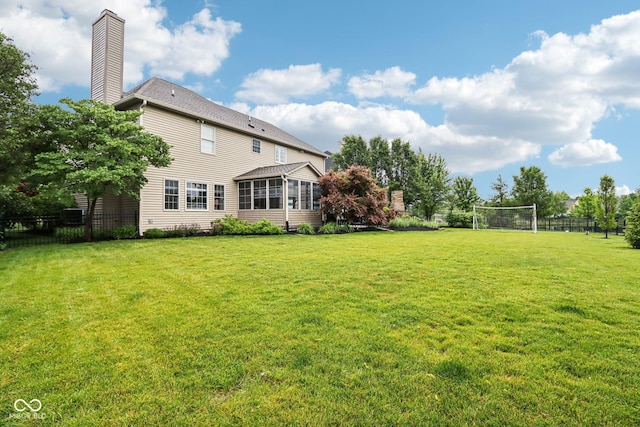 1345 Lewiston Dr, Westfield, IN 46074 - view of yard featuring a sunroom and a sport area