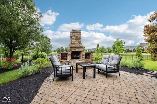 1345 Lewiston Dr, Westfield, IN 46074 - fenced backyard with a patio area and an outdoor living space with a fireplace
