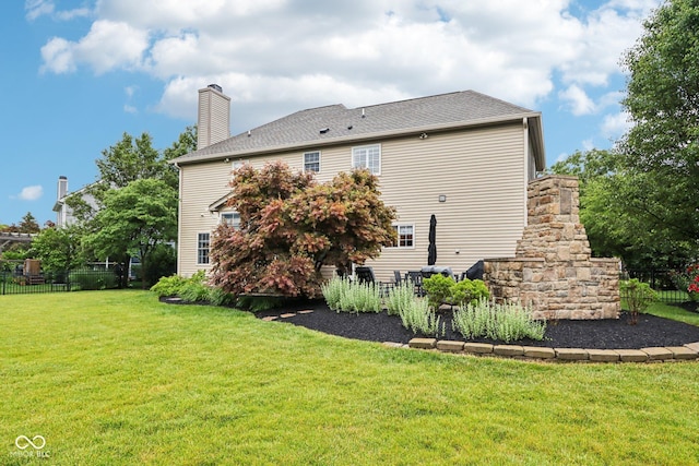 1345 Lewiston Dr, Westfield, IN 46074 - rear view of property with a chimney