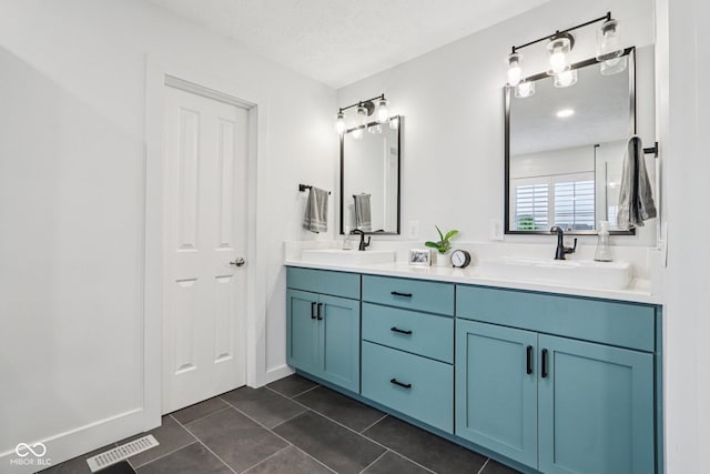 1345 Lewiston Dr, Westfield, IN 46074 - bathroom with double vanity and tile patterned flooring