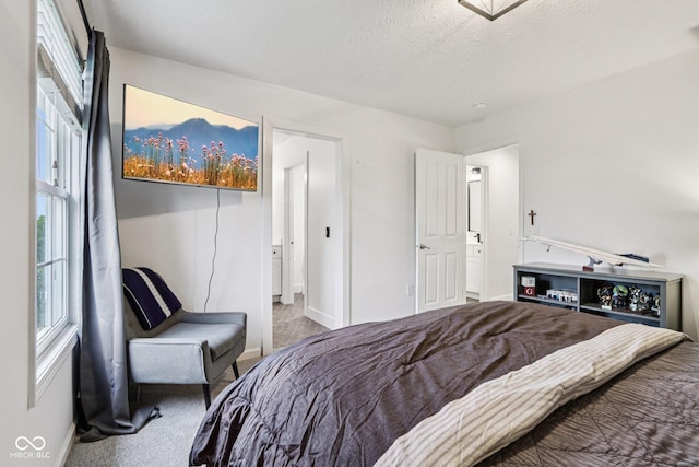 1345 Lewiston Dr, Westfield, IN 46074 - carpeted bedroom with baseboards and a textured ceiling