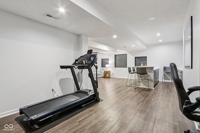 1345 Lewiston Dr, Westfield, IN 46074 - exercise area with wood finished floors and recessed lighting