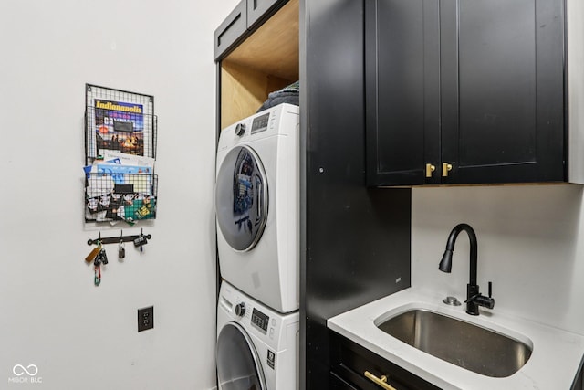 1345 Lewiston Dr, Westfield, IN 46074 - washroom featuring stacked washing machine and dryer and cabinet space