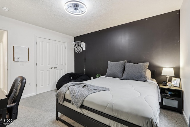 1345 Lewiston Dr, Westfield, IN 46074 - carpeted bedroom featuring a textured ceiling and a closet