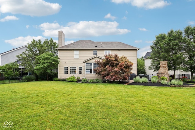 1345 Lewiston Dr, Westfield, IN 46074 - rear view of property featuring a chimney