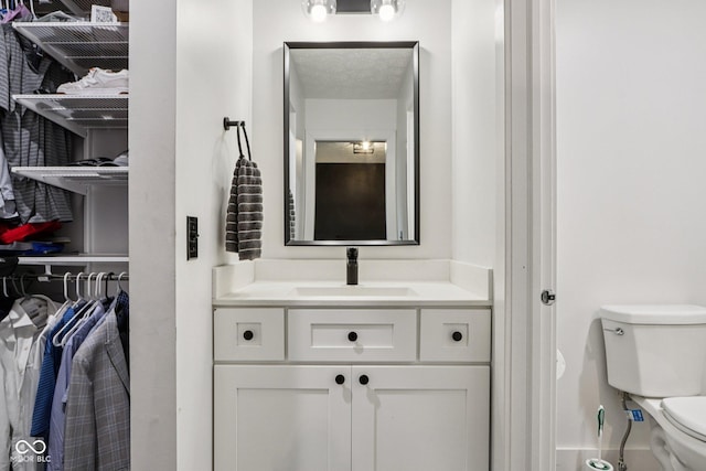 1345 Lewiston Dr, Westfield, IN 46074 - half bathroom featuring vanity and a closet