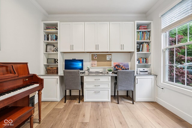 1345 Lewiston Dr, Westfield, IN 46074 - office with built in desk, crown molding, and light wood-type flooring