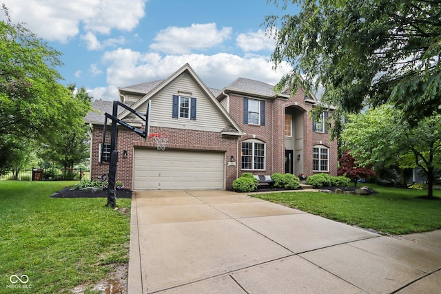 1345 Lewiston Dr, Westfield, IN 46074 - traditional home with a front yard, concrete driveway, brick siding, and a shingled roof