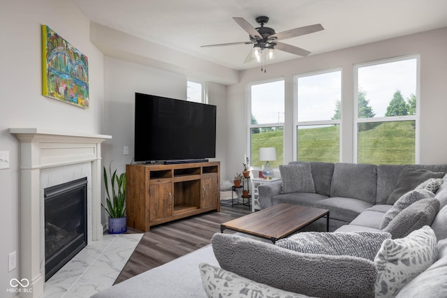 14110 Bay Willow Dr, Fishers, IN 46037 - living area with ceiling fan, a tile fireplace, and wood finished floors