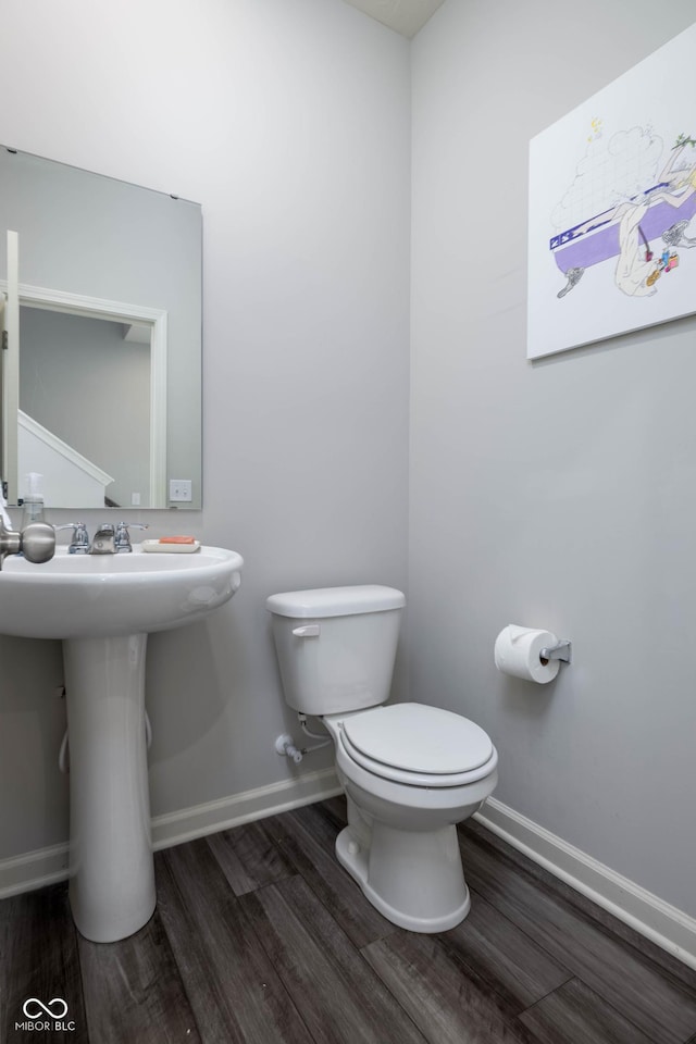 14110 Bay Willow Dr, Fishers, IN 46037 - half bathroom featuring wood finished floors and toilet