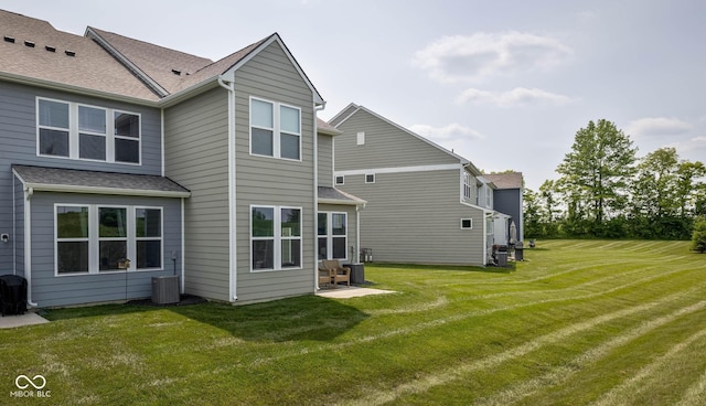 14110 Bay Willow Dr, Fishers, IN 46037 - back of property featuring a lawn and a shingled roof