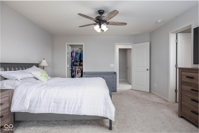 14110 Bay Willow Dr, Fishers, IN 46037 - bedroom with light carpet, a walk in closet, a closet, and ceiling fan