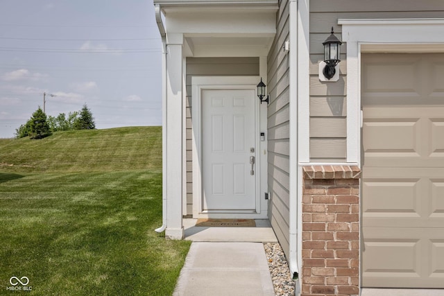 14110 Bay Willow Dr, Fishers, IN 46037 - view of exterior entry with a garage and brick siding
