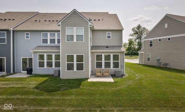 14110 Bay Willow Dr, Fishers, IN 46037 - back of property with roof with shingles, a patio area, and a lawn