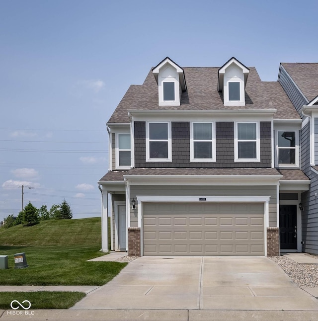 14110 Bay Willow Dr, Fishers, IN 46037 - view of front of house featuring driveway, a garage, a front yard, and brick siding