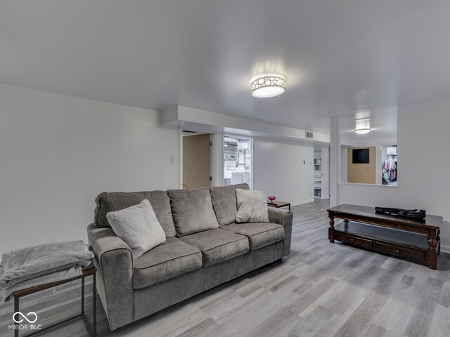 1504 Mcclure Rd, Columbus, IN 47201 - living room with light wood-type flooring and baseboards