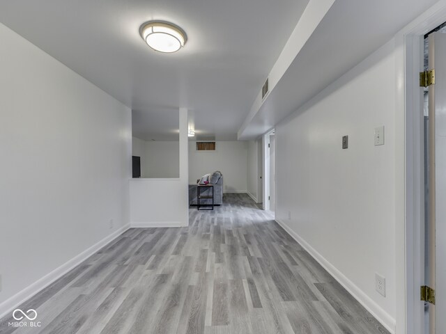 1504 Mcclure Rd, Columbus, IN 47201 - empty room featuring light wood-style floors and baseboards