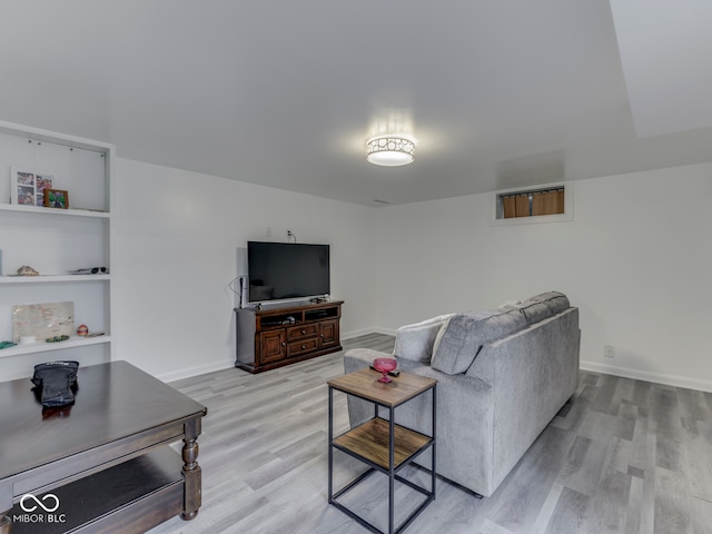1504 Mcclure Rd, Columbus, IN 47201 - living room with light wood-type flooring and baseboards