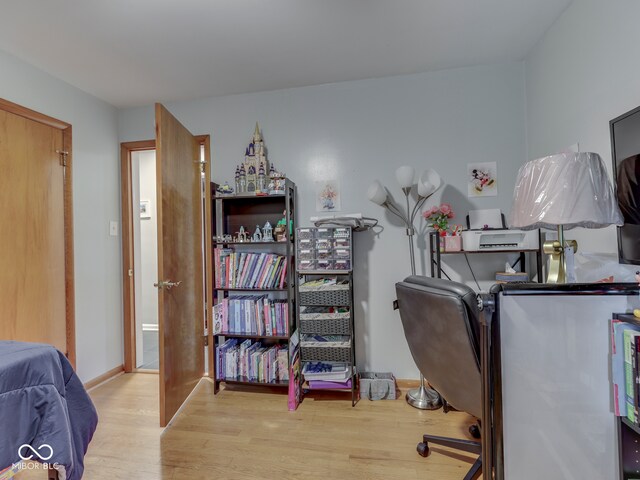1504 Mcclure Rd, Columbus, IN 47201 - bedroom with wood finished floors and baseboards