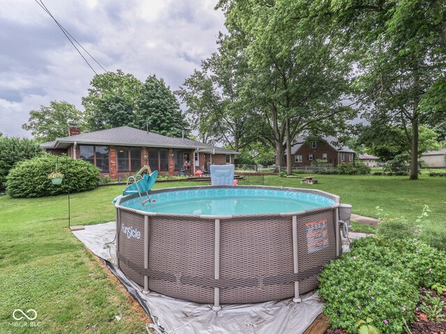 1504 Mcclure Rd, Columbus, IN 47201 - swimming pool with a lawn